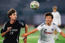 Coronado midfielder Aiden Sena (10) chases the ball during a high school soccer game at Palo Ve ...