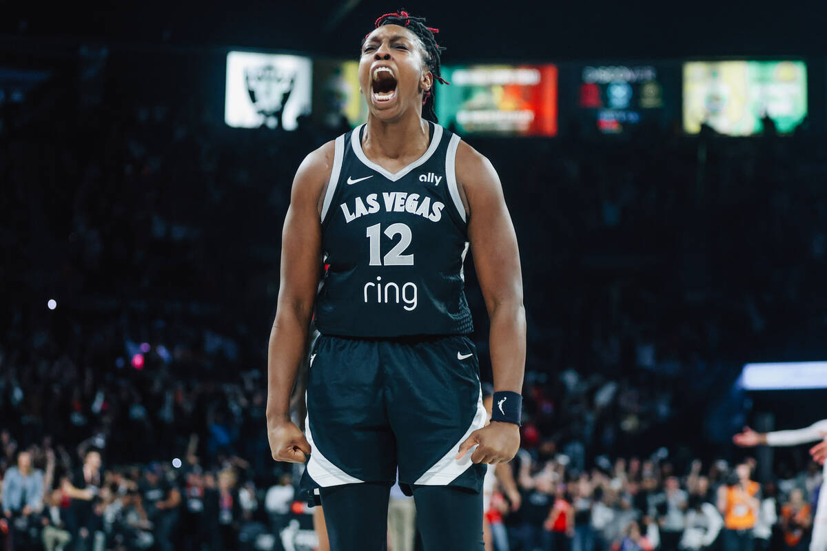 Aces guard Chelsea Gray celebrates winning game one of a WNBA finals basketball game between th ...