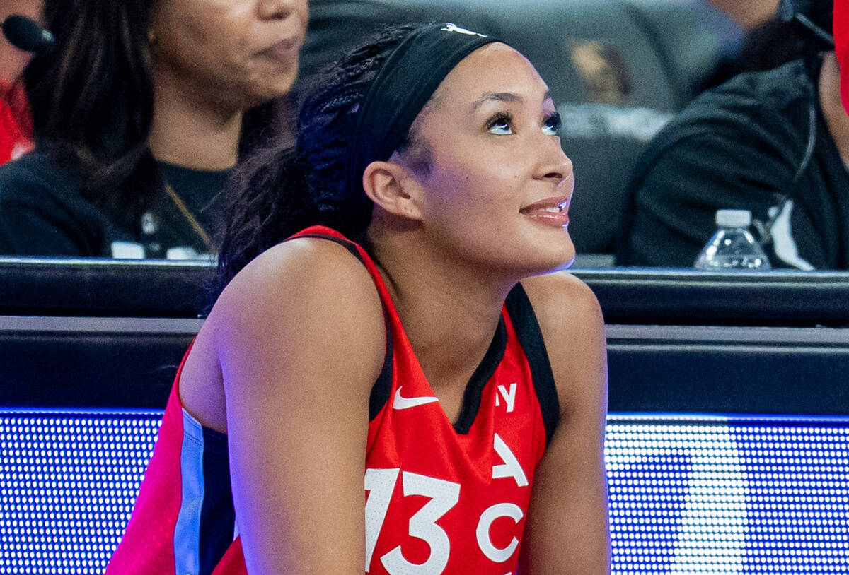 Aces’s Guard-Forward Aaliyah Nye (13) looks at the Jumbotron during a basketball game ag ...