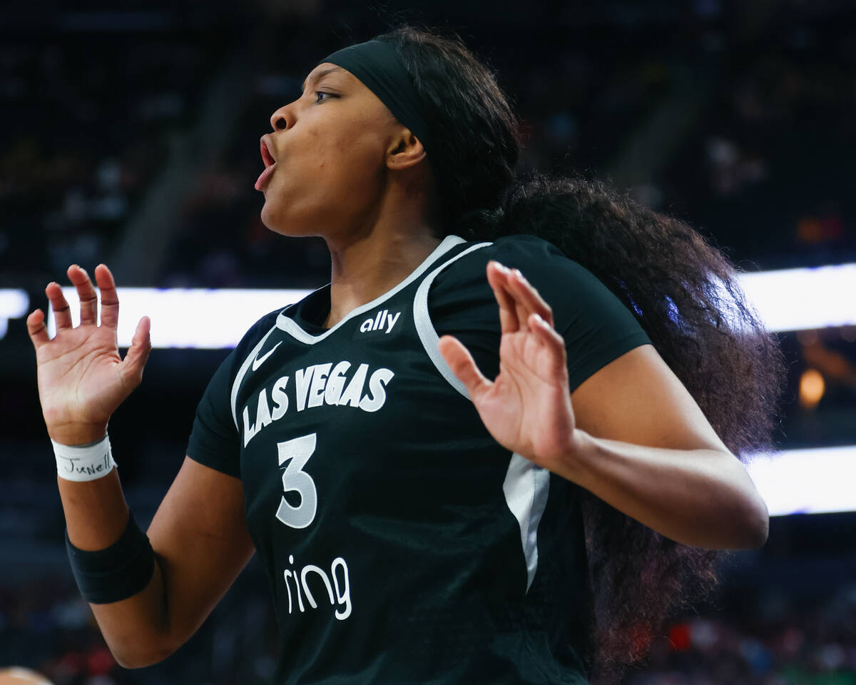 Aces forward NaLyssa Smith (3) reacts to missing a three-pointer during the second half of the ...