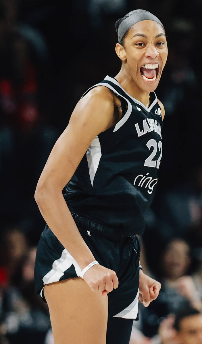 Aces center A'ja Wilson (22) celebrates during game one of a WNBA finals basketball game b ...