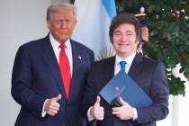 President Donald Trump greets Argentina's President Javier Milei, as he arrives at the Whi ...