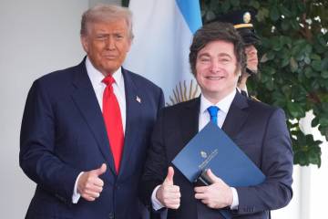 President Donald Trump greets Argentina's President Javier Milei, as he arrives at the Whi ...