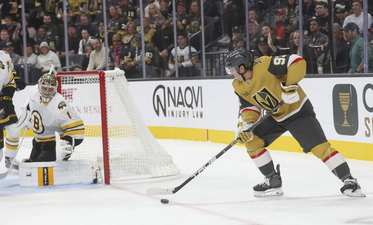 Golden Knights right wing Mitch Marner (93) looks to shoot against Boston Bruins goaltender Jer ...