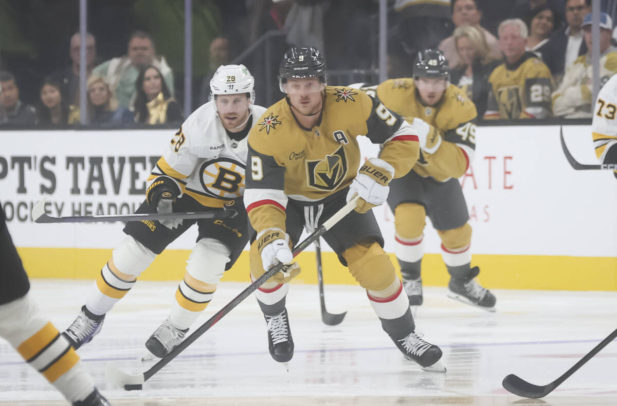 Golden Knights center Jack Eichel (9) skates with the puck against the Boston Bruins during the ...