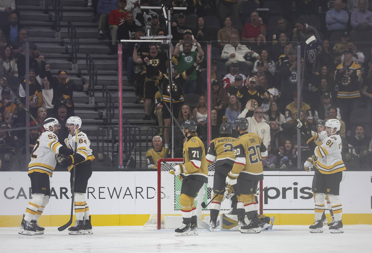 The Boston Bruins score against the Golden Knights during the first period of an NHL hockey gam ...