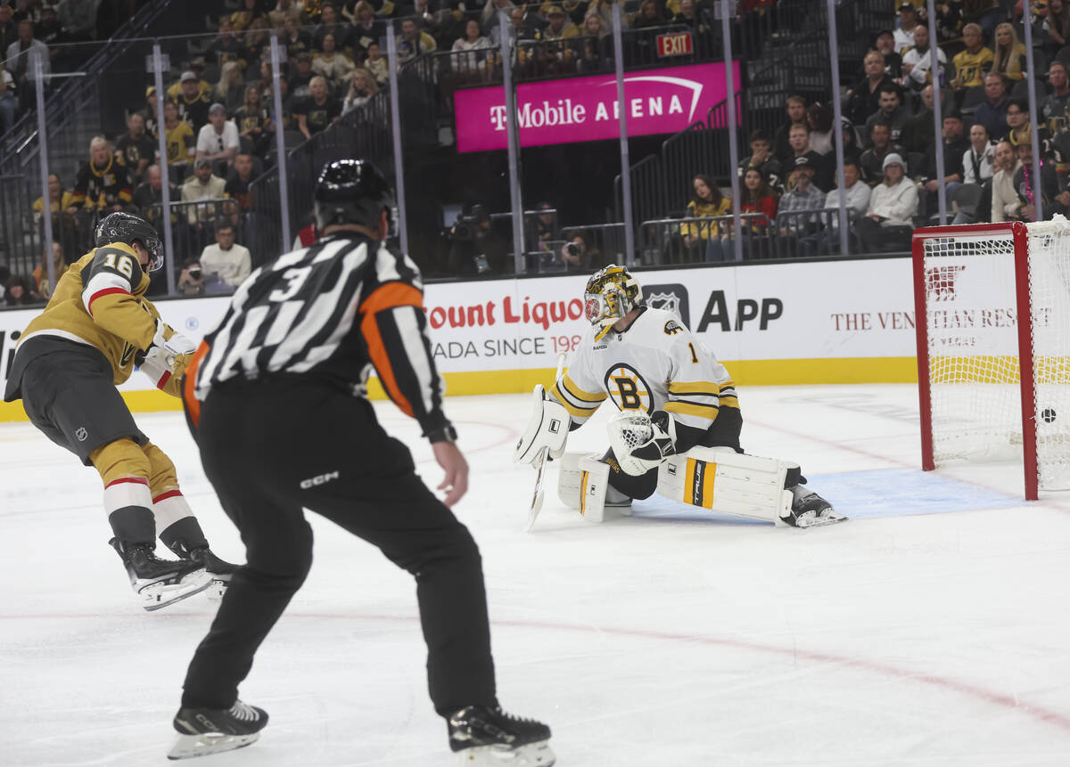 Golden Knights right wing Pavel Dorofeyev (16) scores a goal past Boston Bruins goaltender Jere ...