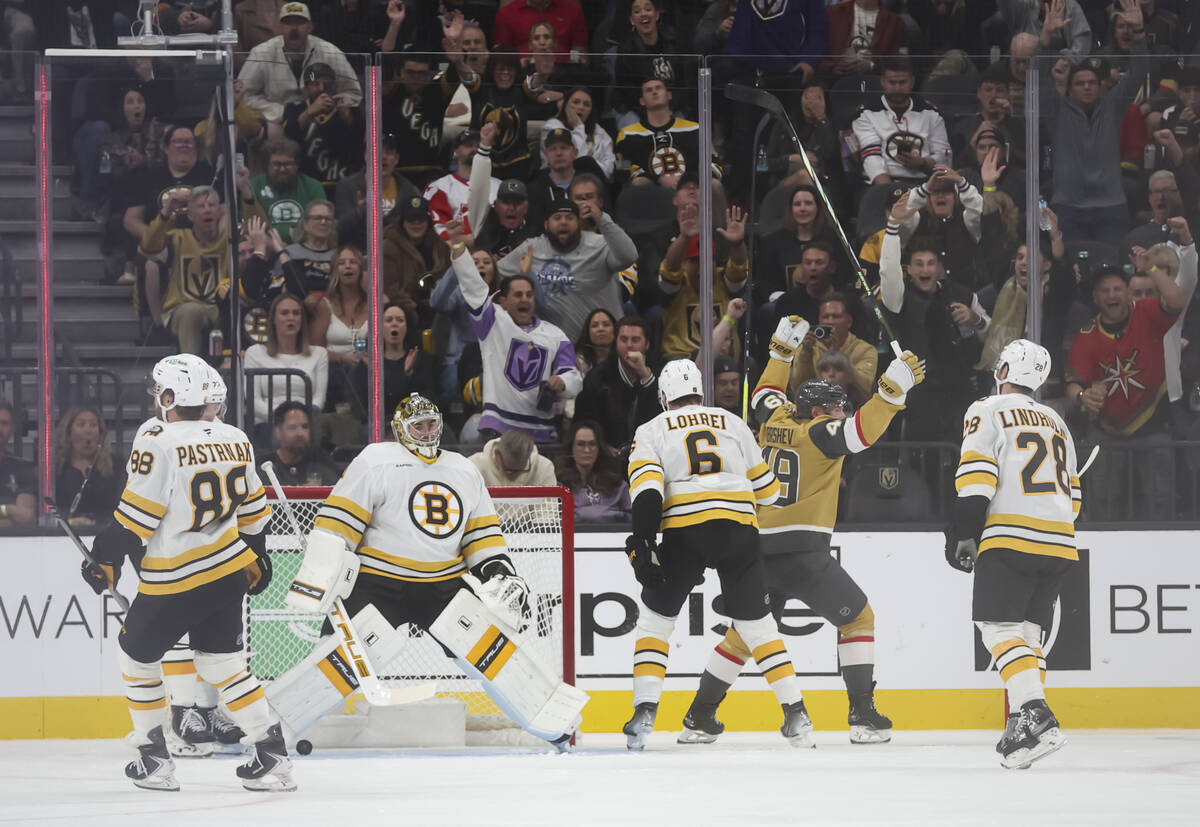 Golden Knights left wing Ivan Barbashev (49) celebrates as the team scores against the Boston B ...