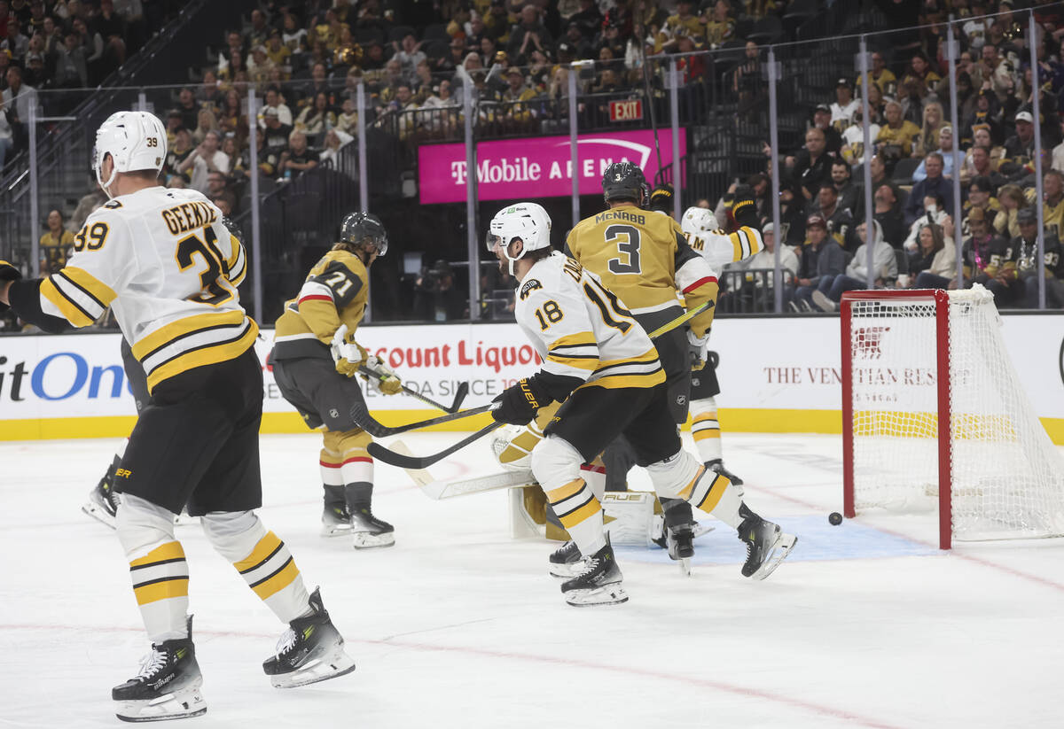 The Boston Bruins score against the Golden Knights during the second period of an NHL hockey ga ...