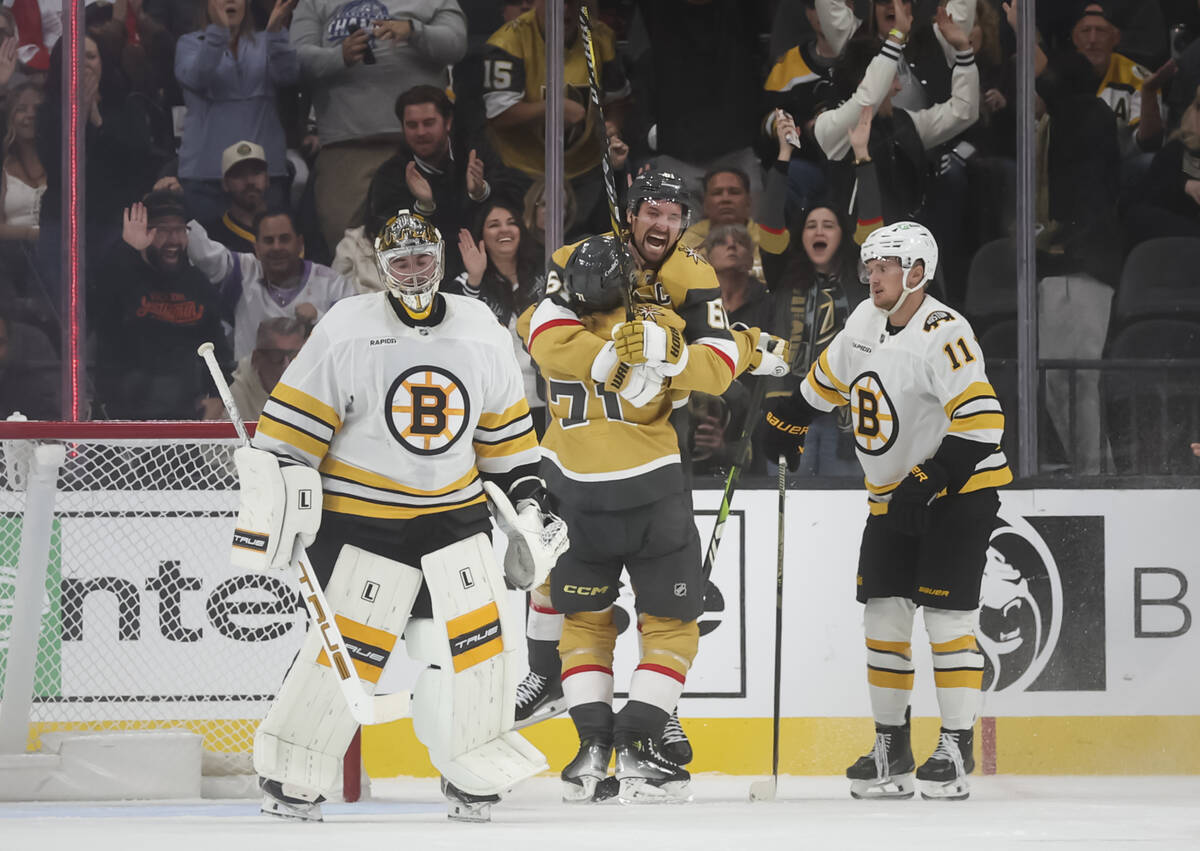 Golden Knights center William Karlsson (71) celebrates his goal against the Boston Bruins with ...