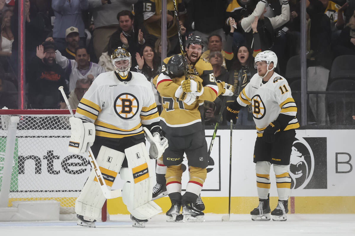 Golden Knights center William Karlsson (71) celebrates his goal against the Boston Bruins with ...