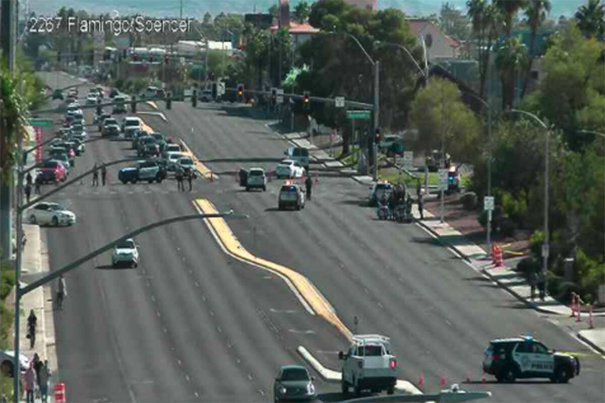 Police investigate a crash Thursday, Oct. 16, 2025, at Burnham Avenue and East Flamingo Road in ...