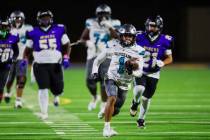 Silverado running back Armani Combs runs the ball down the field during a football game between ...