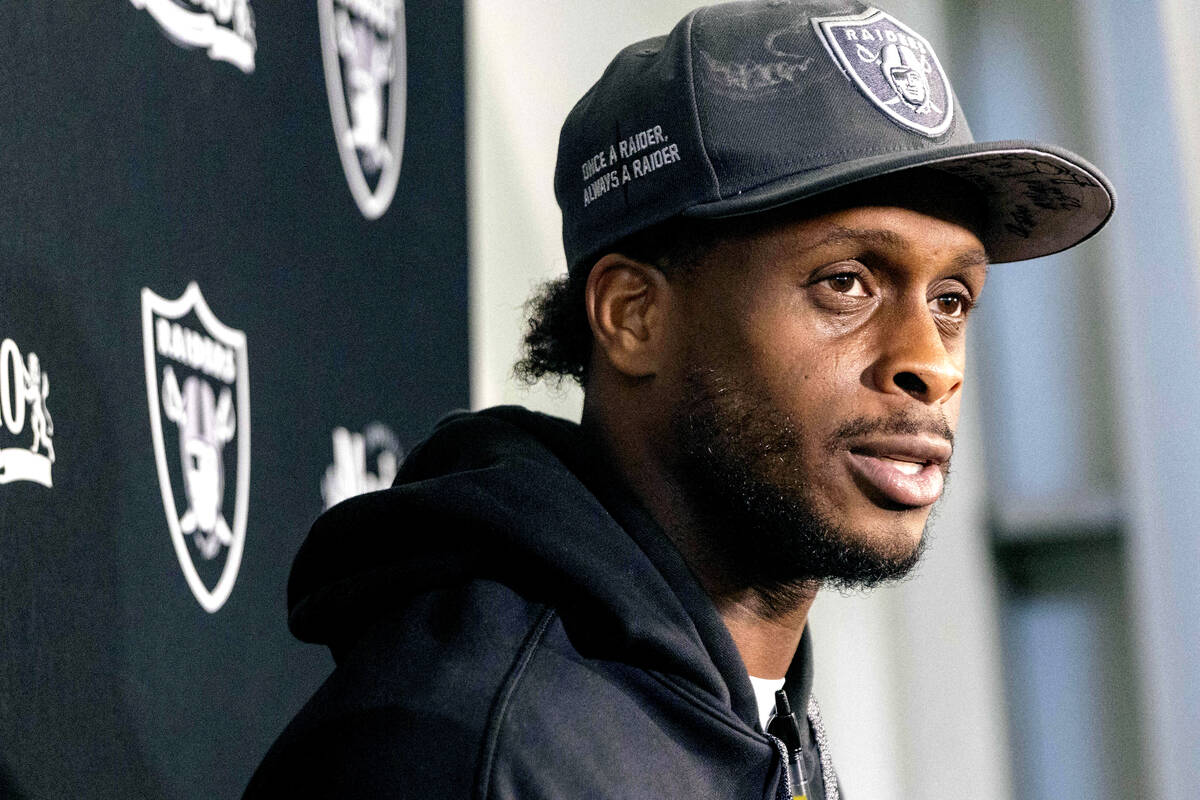 Raiders quarterback Geno Smith answers questions during a news conference at the Intermountain ...