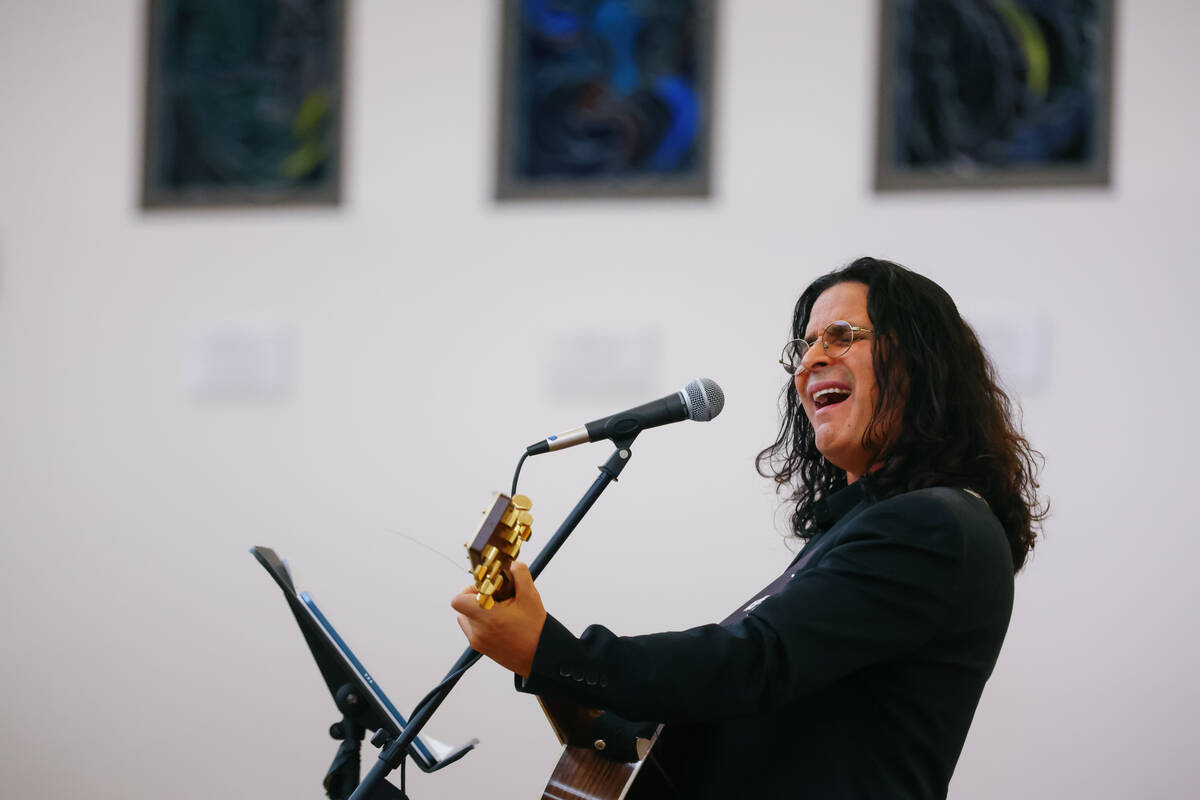 Micha Biton sings during a commemoration event to remember the October 7 attacks on Israel on T ...