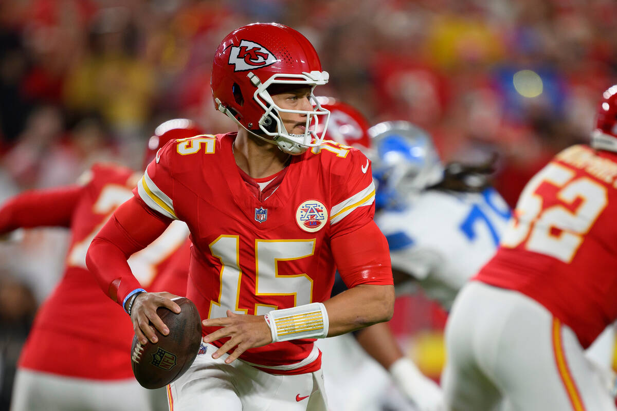 Kansas City Chiefs quarterback Patrick Mahomes looks to pass against the Detroit Lions during t ...