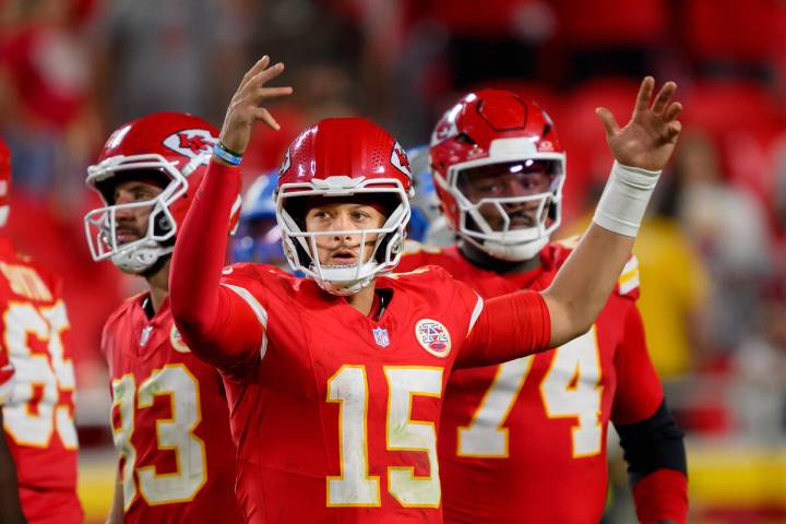 Kansas City Chiefs quarterback Patrick Mahomes (15) celebrates as time runs down in their NFL f ...