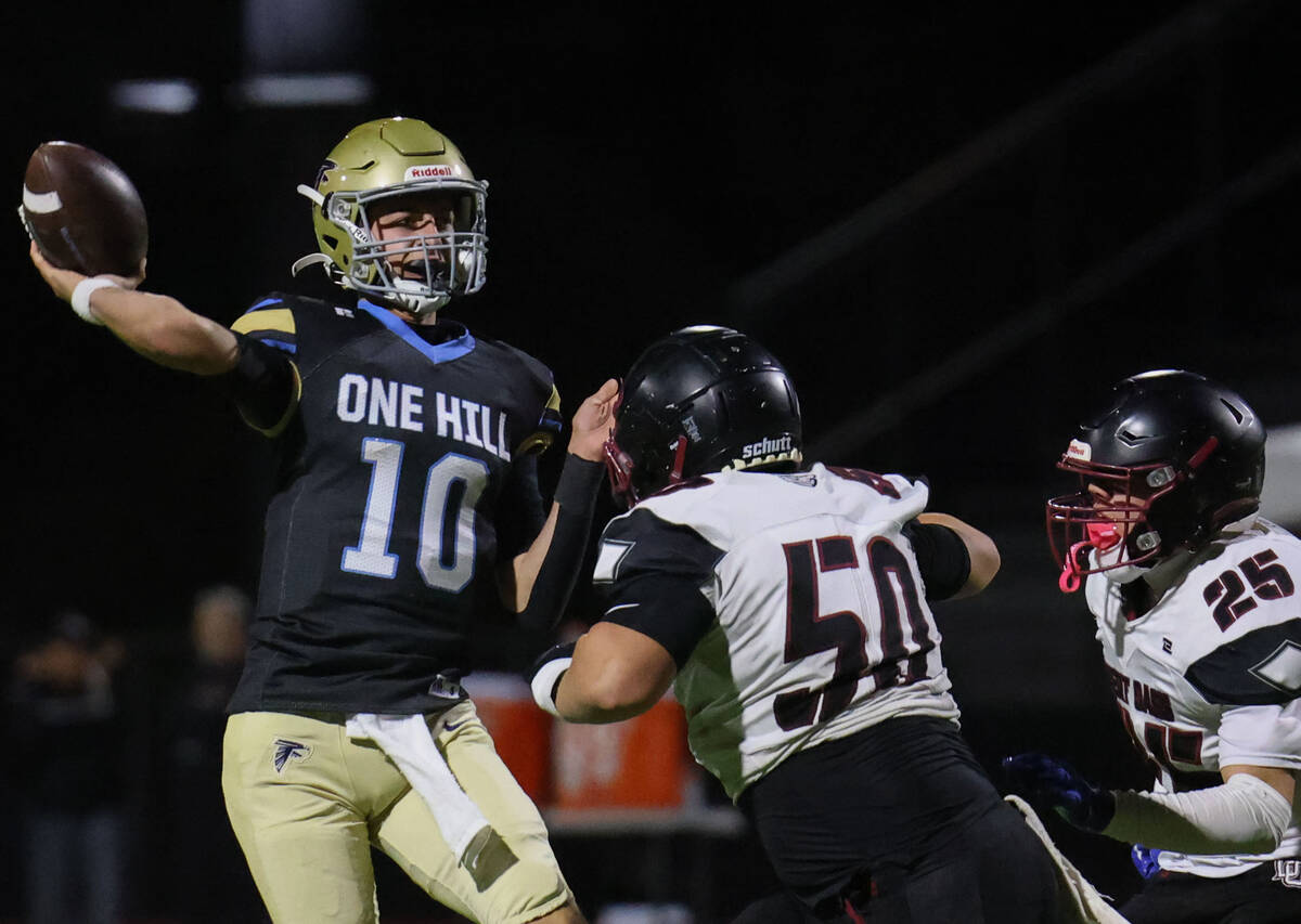 Foothill quarterback Ryder Dobbs (10) makes a running throw over Desert Oasis linebacker Lane M ...