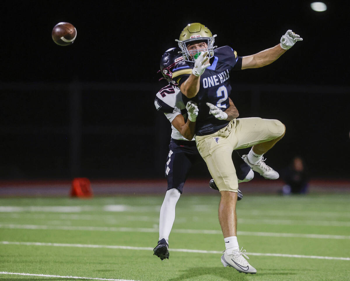 Foothill wide receiver Nixon Gasperosky (2) has his pass batted away by Desert Oasis defensive ...