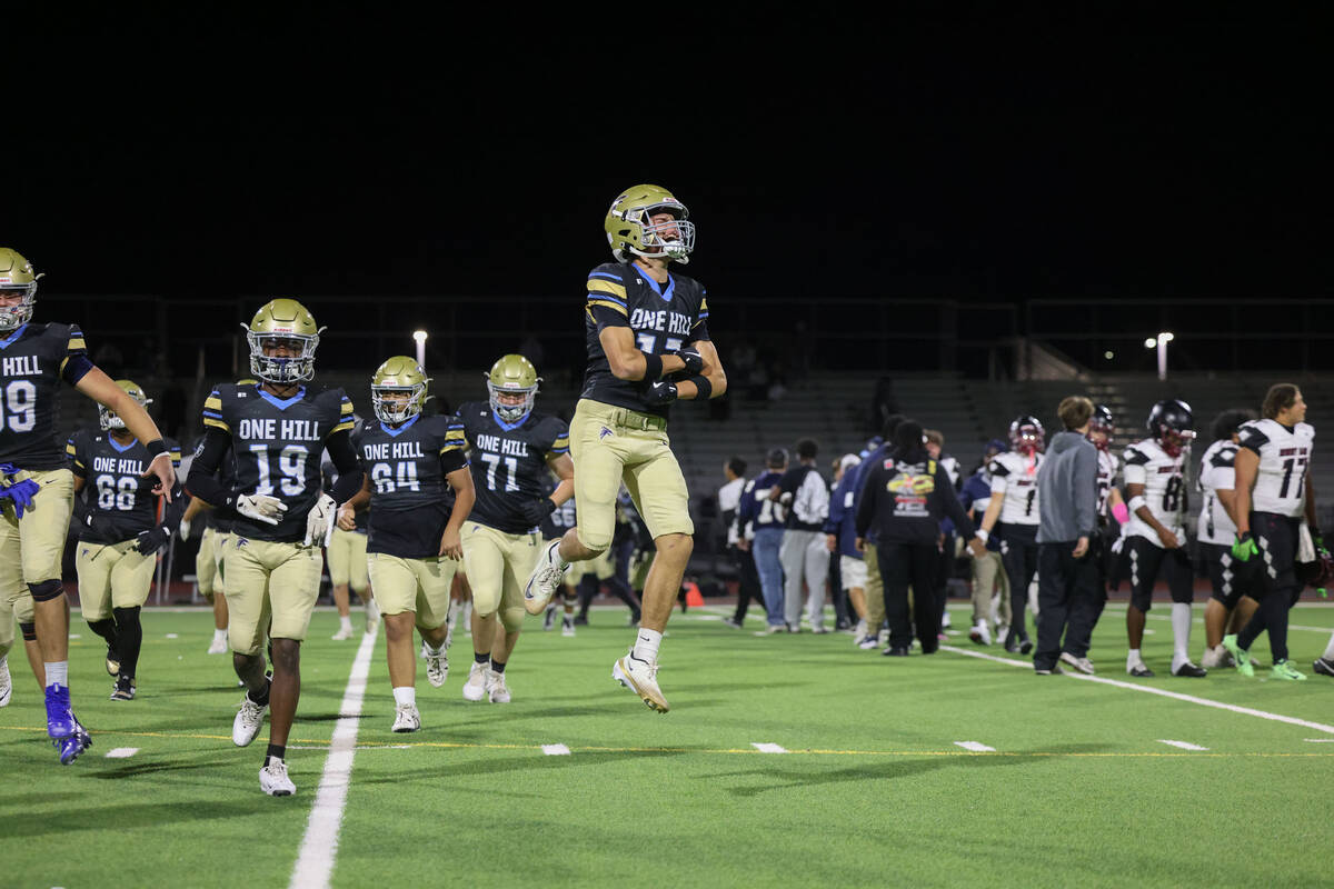 Foothill wide receiver Owen Preslan-Aldrigde, middle, celebrates after beating Desert Oasis Fri ...