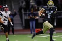 Foothill wide receiver Braxton Bonnett (5) makes the go-ahead touchdown catch and run past Dese ...