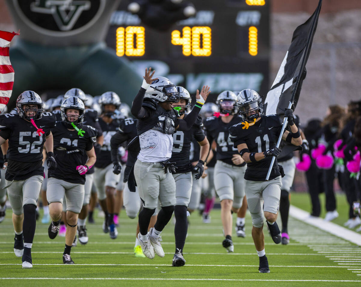 Palo Verde players take the field to face Shadow Ridge during the first half of their NIAA foot ...
