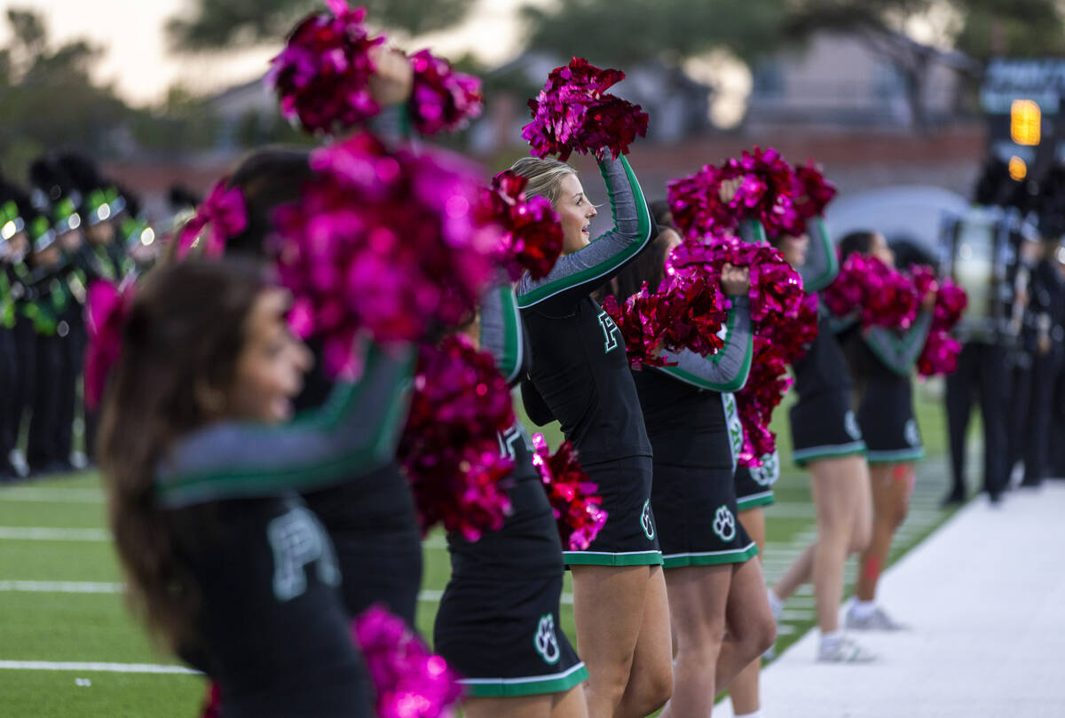 Palo Verde cheerleaders support their players against Shadow Ridge during the first half of the ...