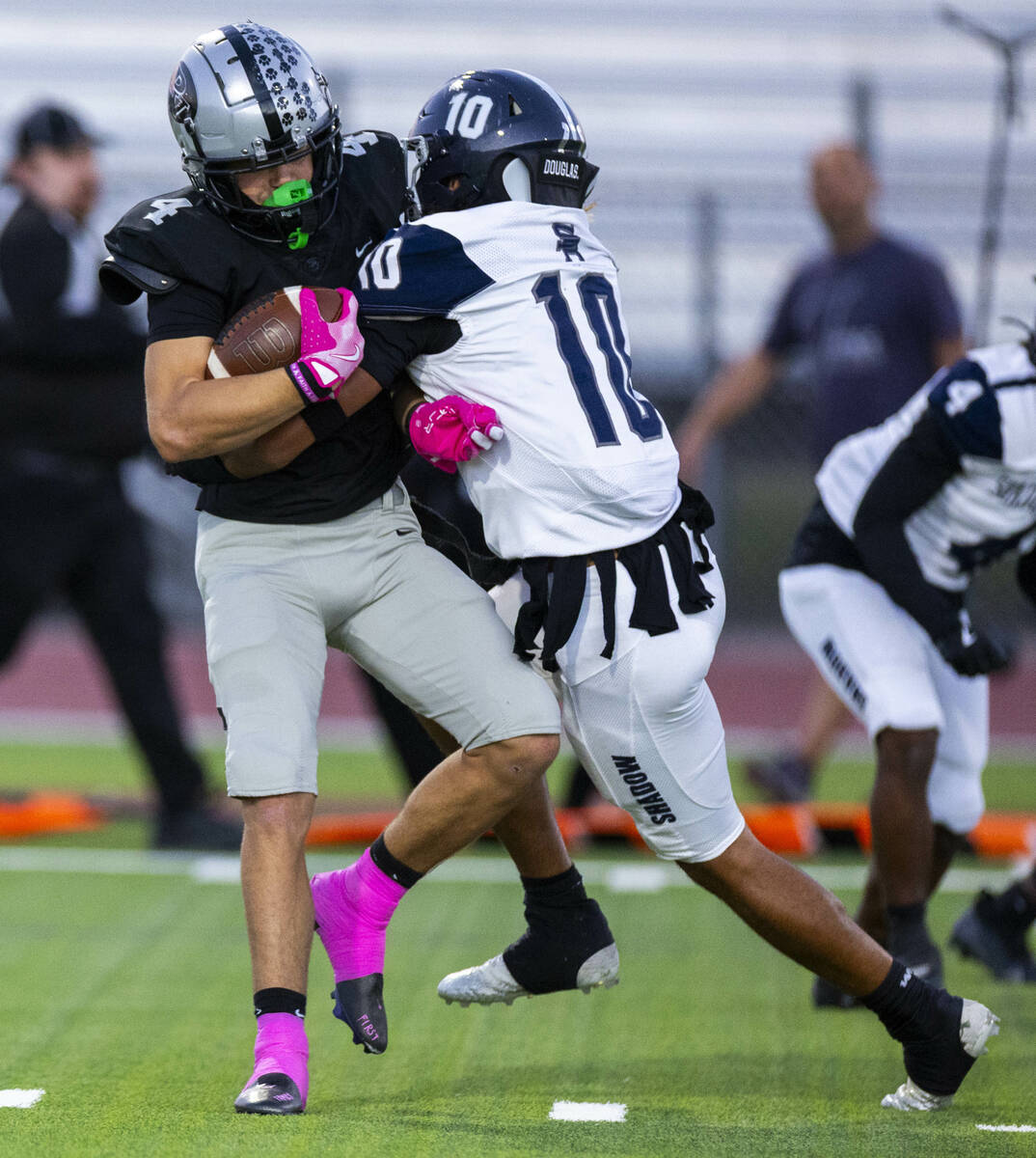 Palo Verde's Beau Gardineer (4) is stopped on a kickoff run by Shadow Ridge's Kawika ...