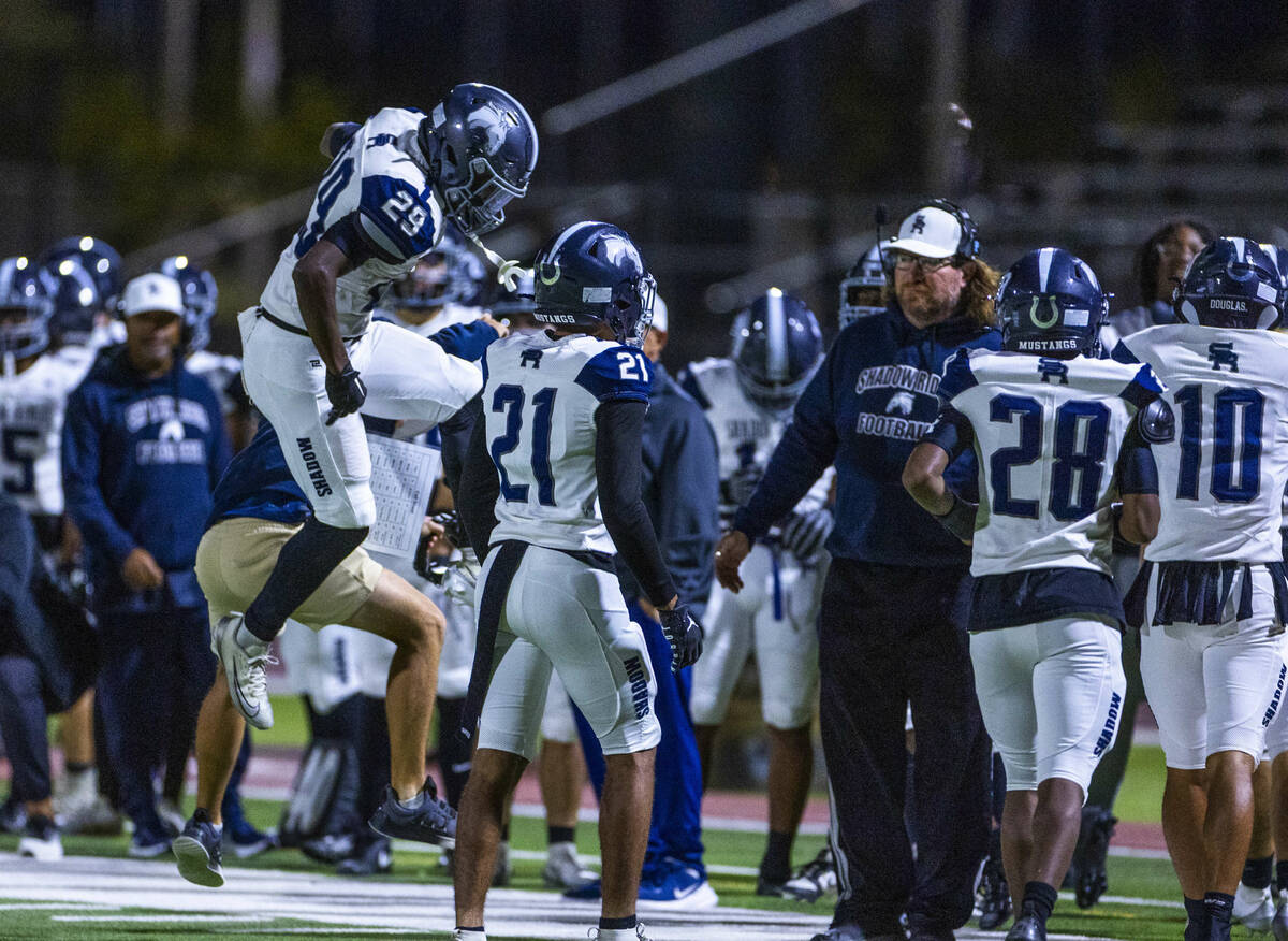 Shadow Ridge's Trevin Young (29) celebrates another touchdown against Palo Verde during th ...
