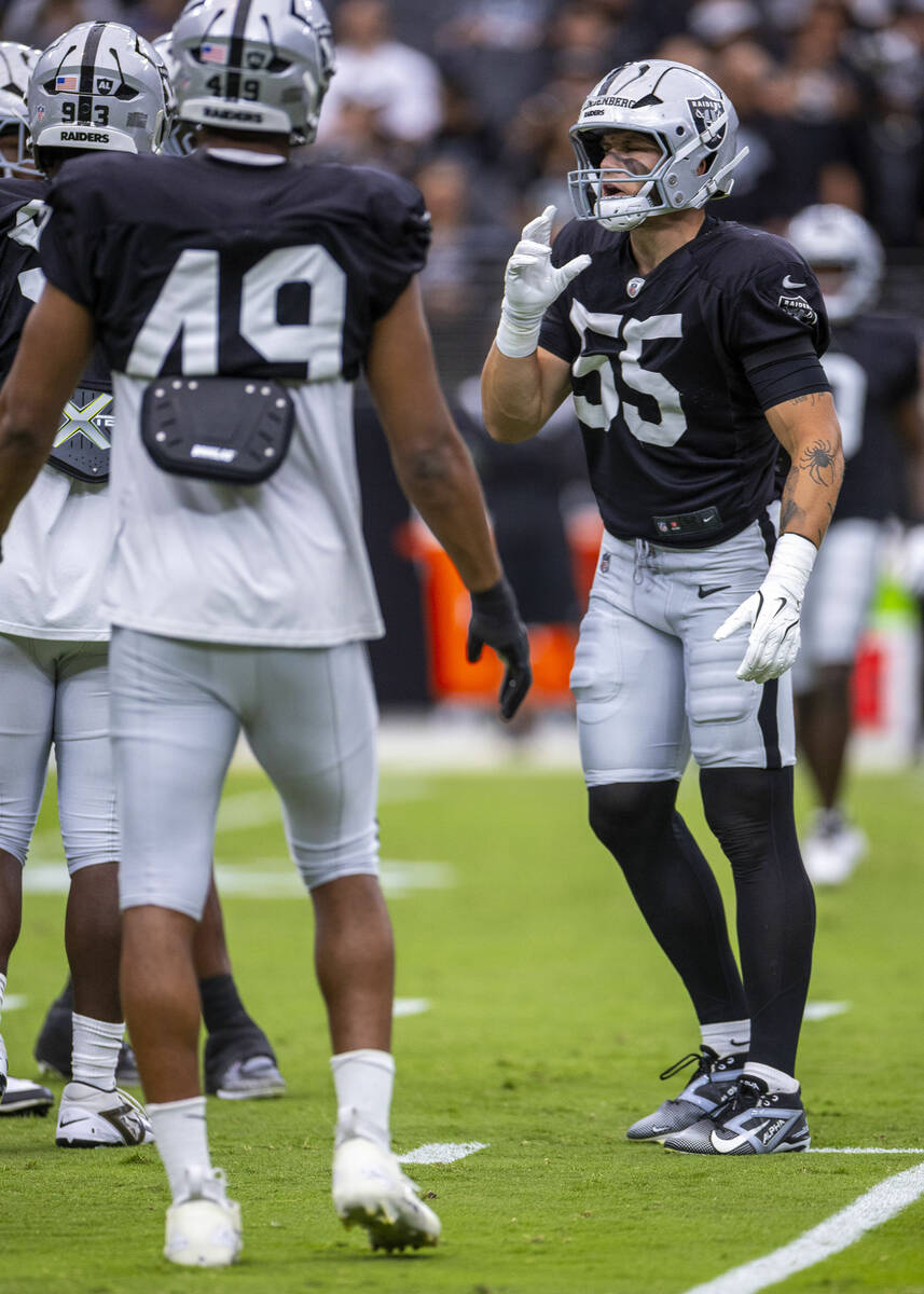 Raiders linebacker Cody Lindenberg (55) relays a play call to teammates during the first half o ...