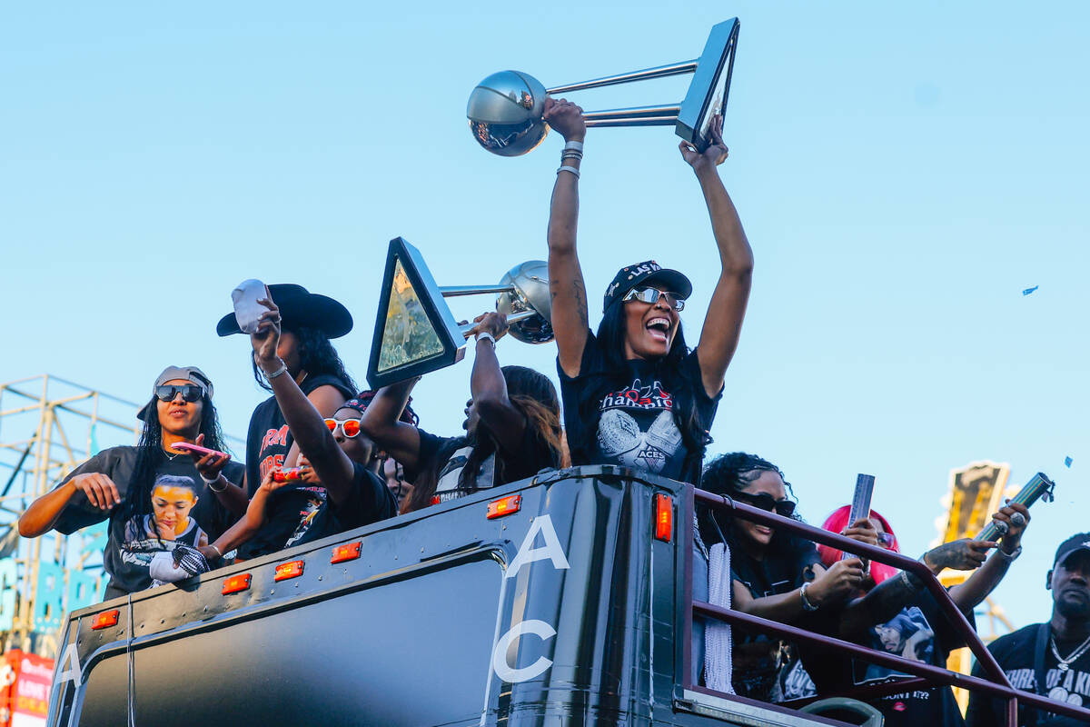 The Aces celebrate during their championship parade on the Strip Friday, Oct. 17, 2025, in Las ...