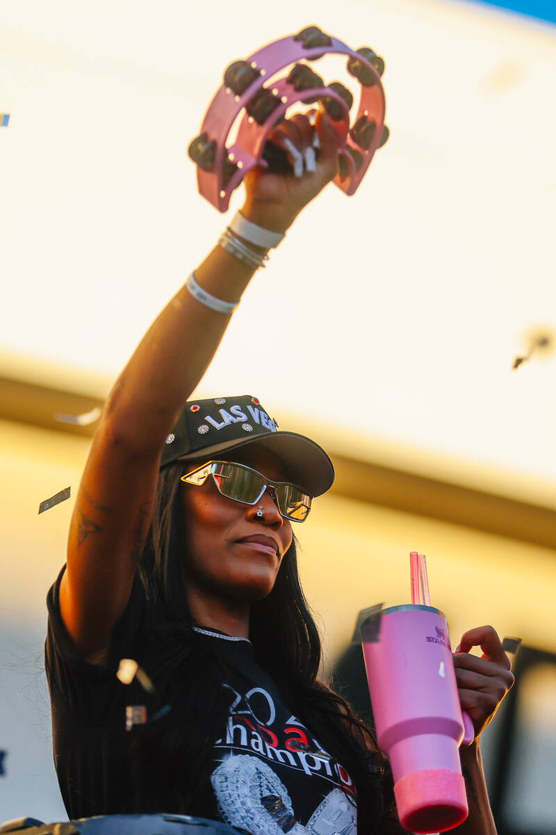 Aces center A'ja Wilson celebrates during the Aces’ championship parade on the Stri ...