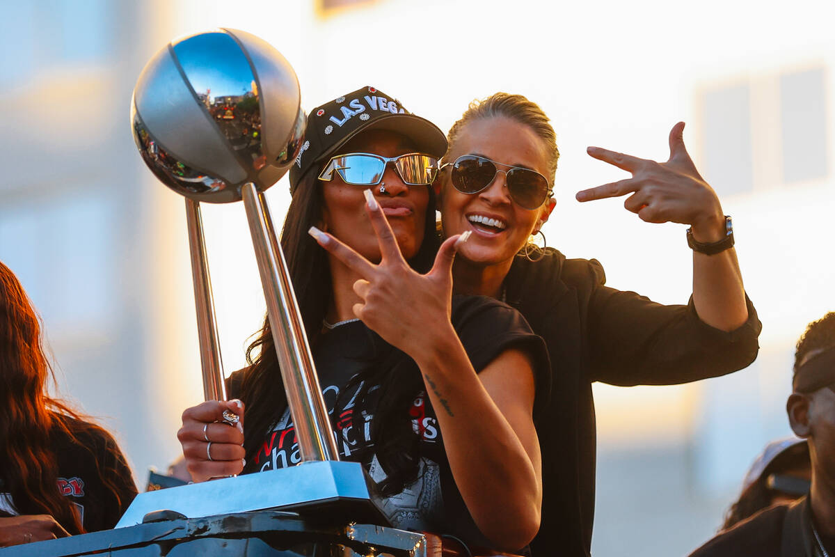 Aces center A'ja Wilson, left, poses with head coach becky Hammon during the Aces’ ...