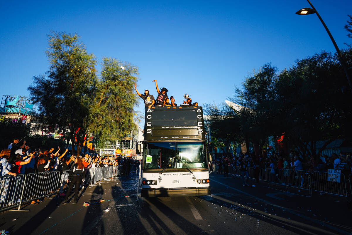 The Aces celebrate during their championship parade on the Strip Friday, Oct. 17, 2025, in Las ...