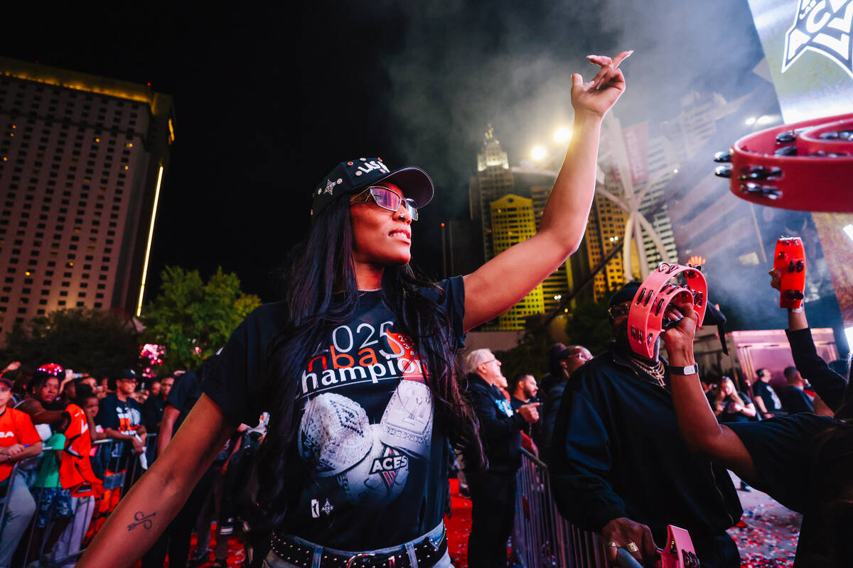 Aces center A'ja Wilson dances during the Aces’ championship parade on the Strip Fr ...