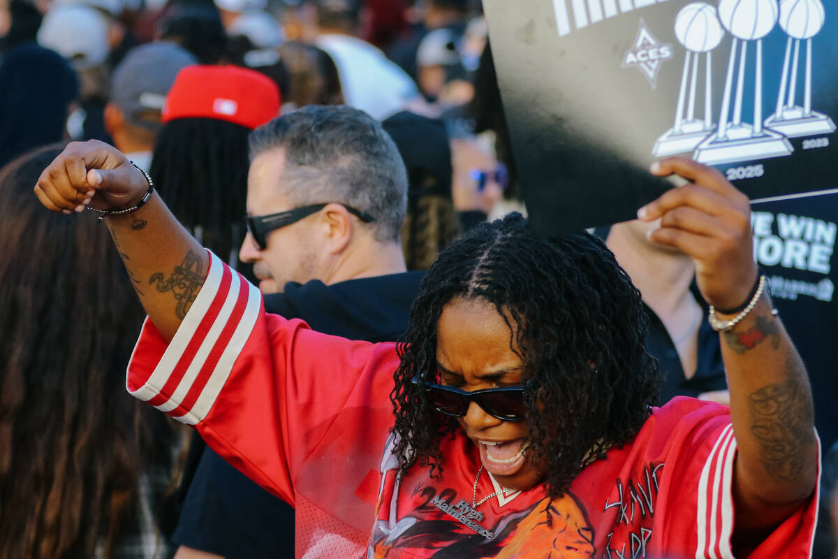 Fans celebrate the Aces’ fourth championship title during the Aces’ championship ...