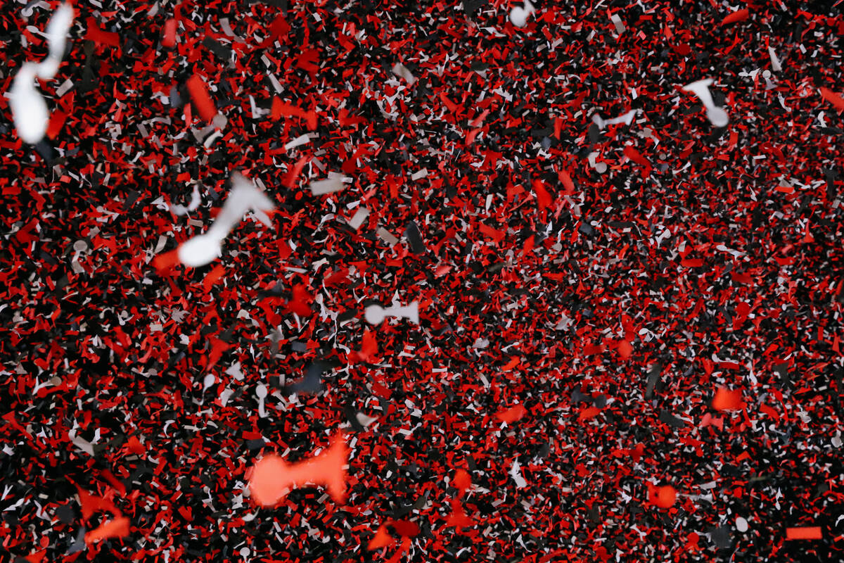 Confetti shaped like the WBNA Championship Trophy falls during the Aces’ championship pa ...