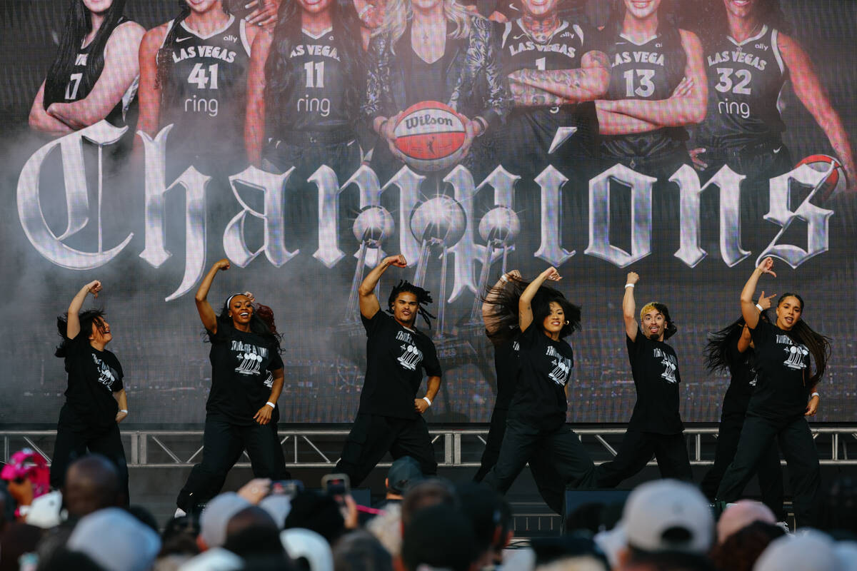 The Wild Card Crew performs for the crowd during the Aces’ championship parade on Friday ...