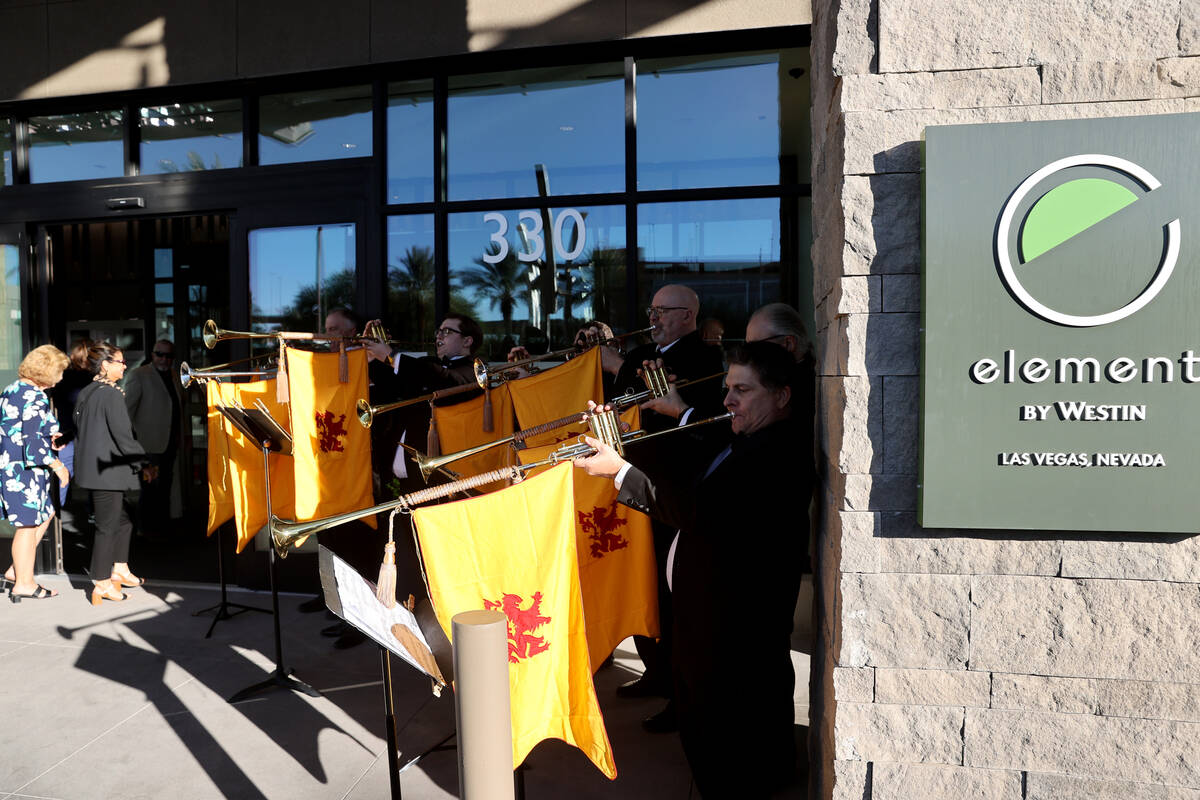 Members of the Las Vegas Philharmonic welcome guests during the grand opening of the dual-brand ...