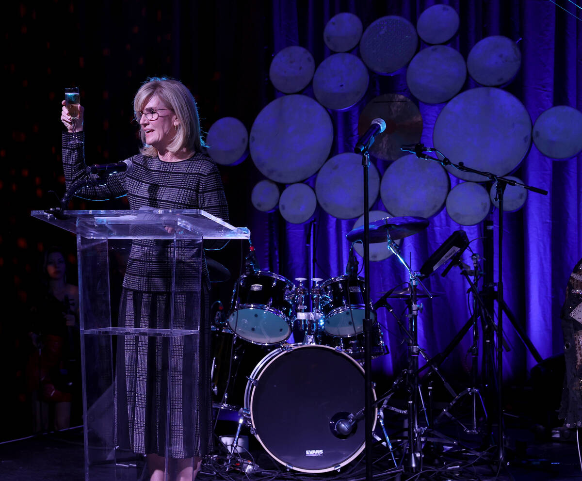 Jackson-Shaw President and CEO Michele Wheeler toasts during the grand opening of the dual-bran ...