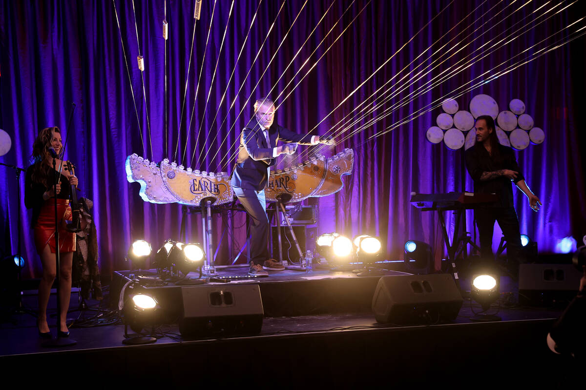 William Close and the Earth Harp Collective perform during the grand opening of the dual-brande ...