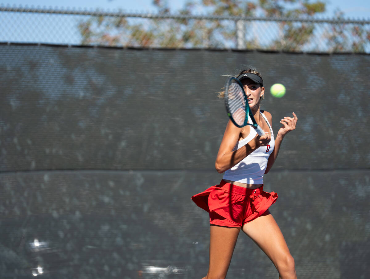 Coronado’s Kamilah Saine returns the ball to Palo Verde’s Nicole Perrin during th ...