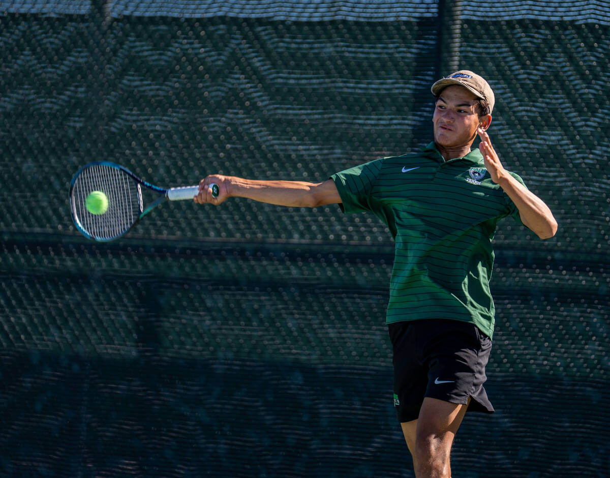Palo Verde players warm up with each other during the 5A state doubles and singles title match ...