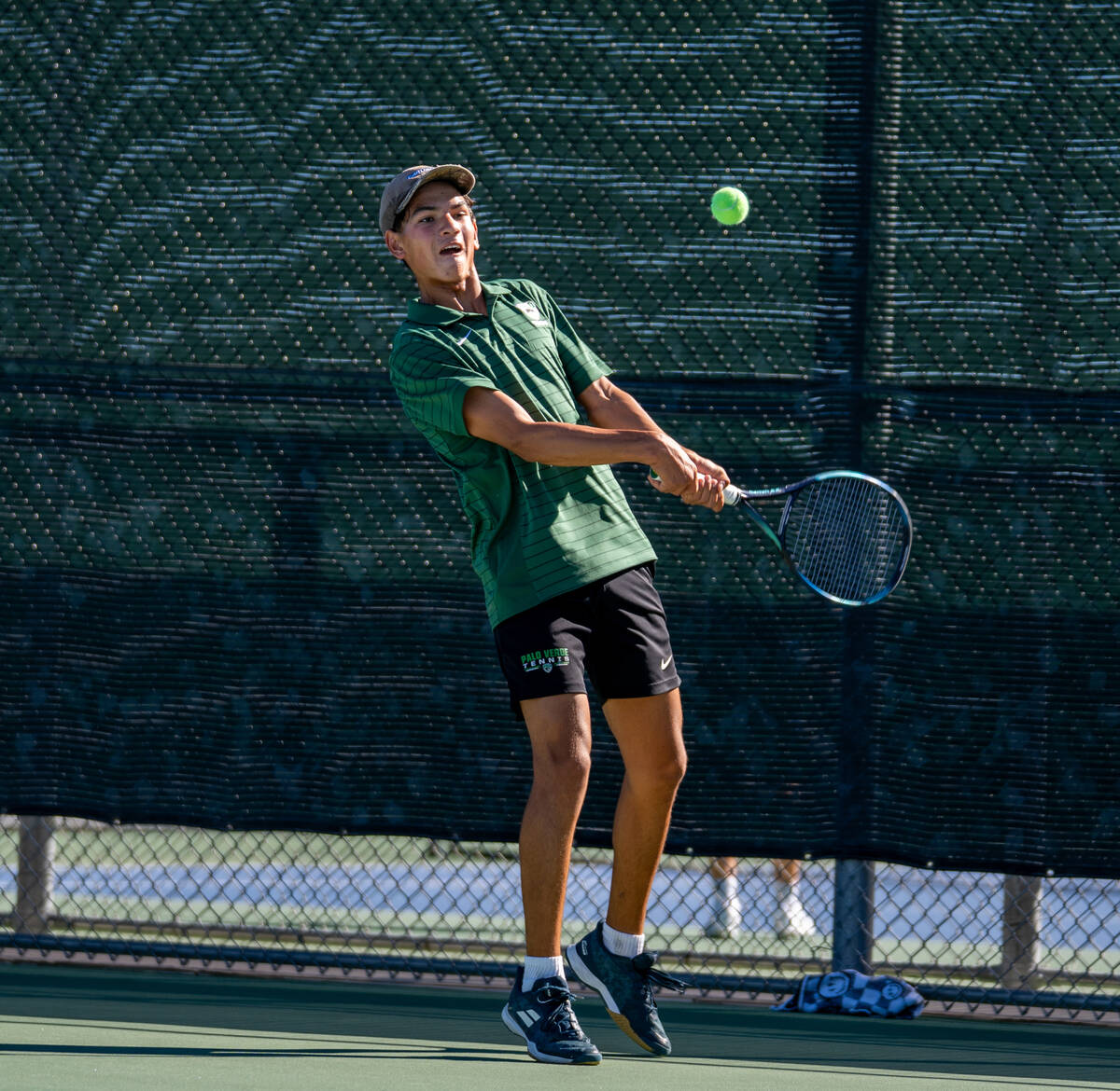 Palo Verde players warm up with each other during the 5A state doubles and singles title match ...