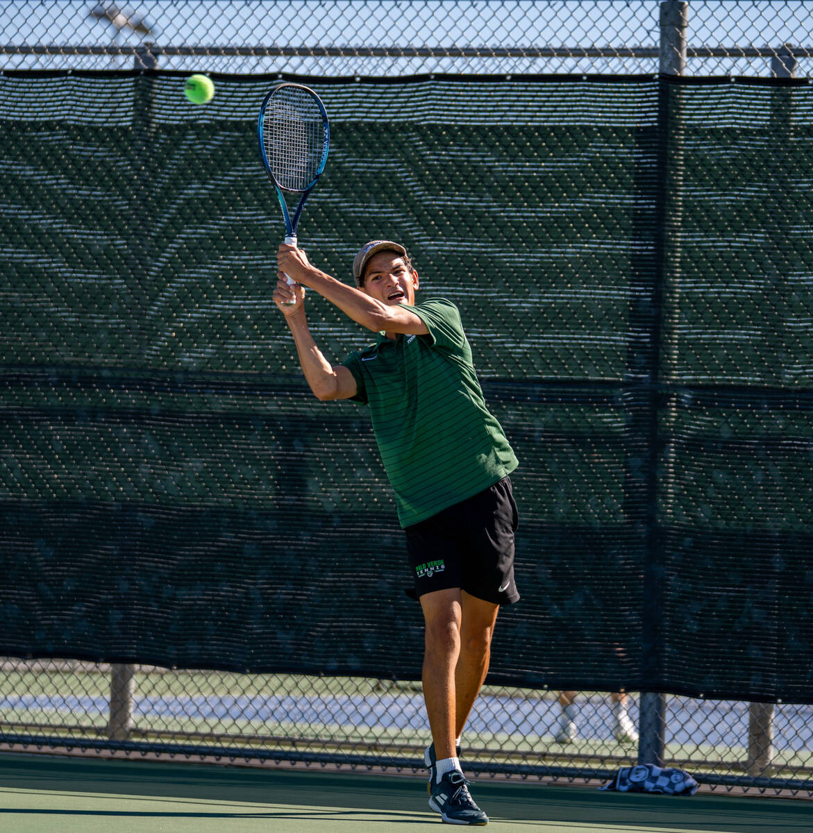 Palo Verde players warm up with each other during the 5A state doubles and singles title match ...