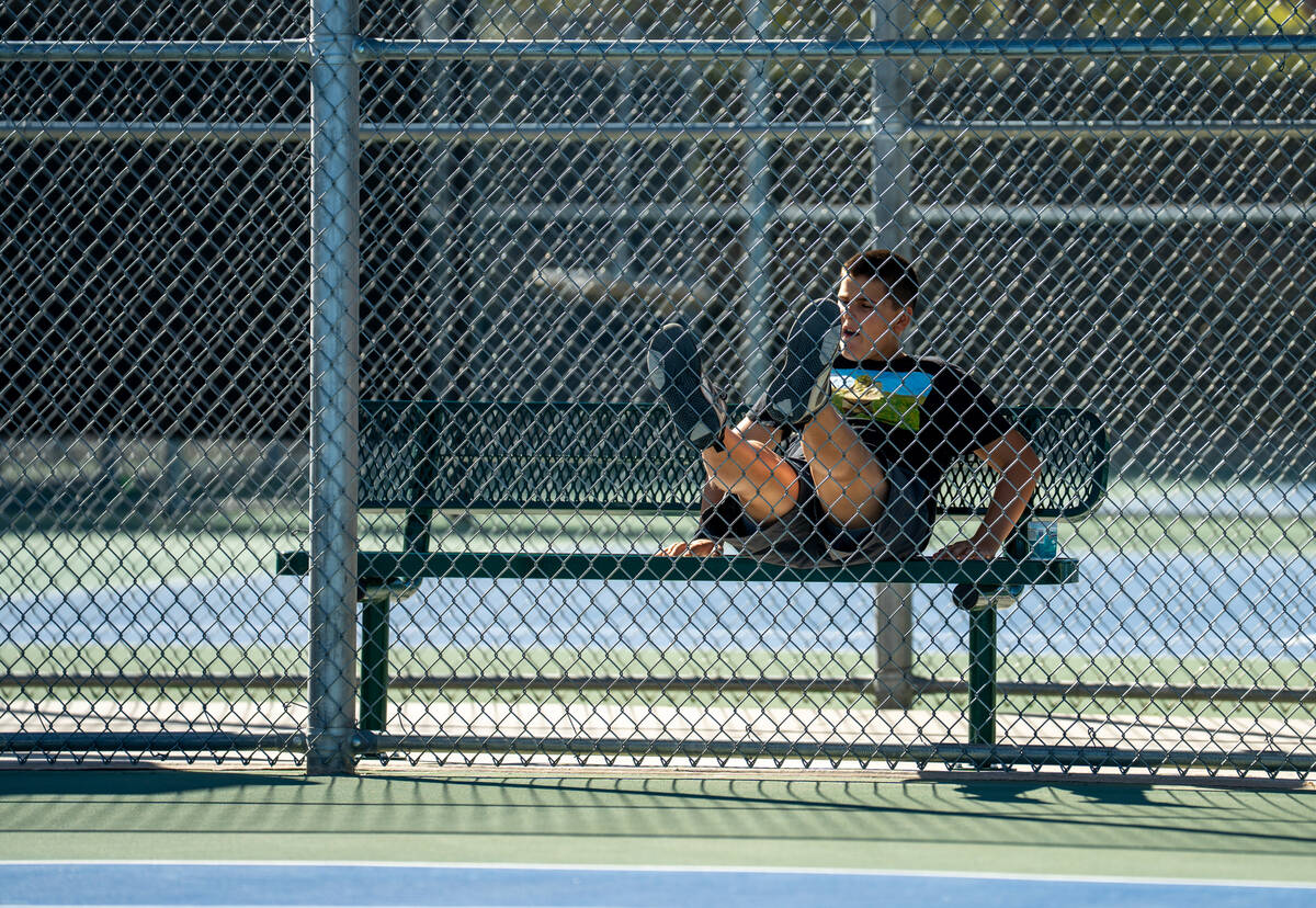 Spectators watch the 5A state singles and doubles title matches at Bishop Gorman High School in ...