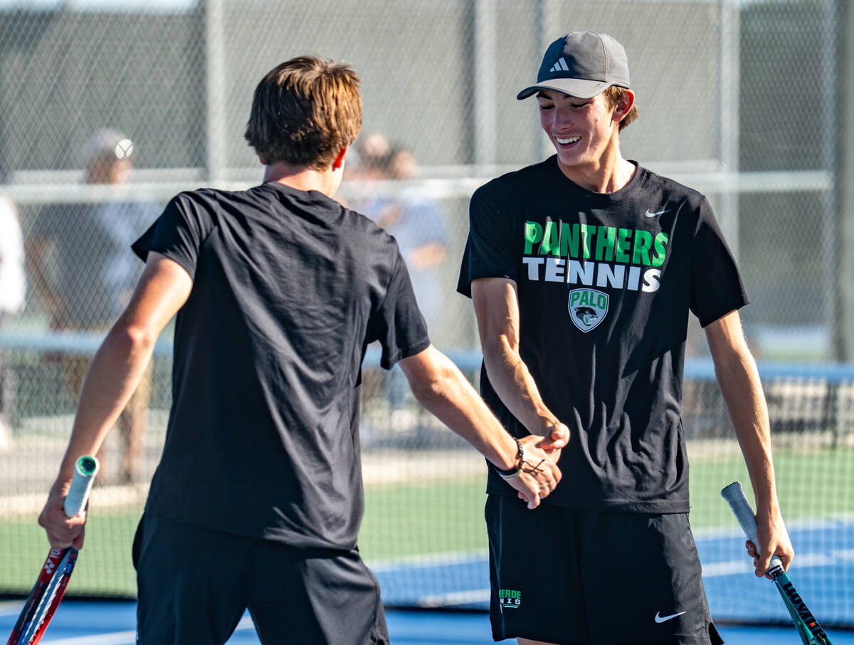 [HELP IDing NEEDED] Palo Verde double’s partners celebrate after winning a point during ...