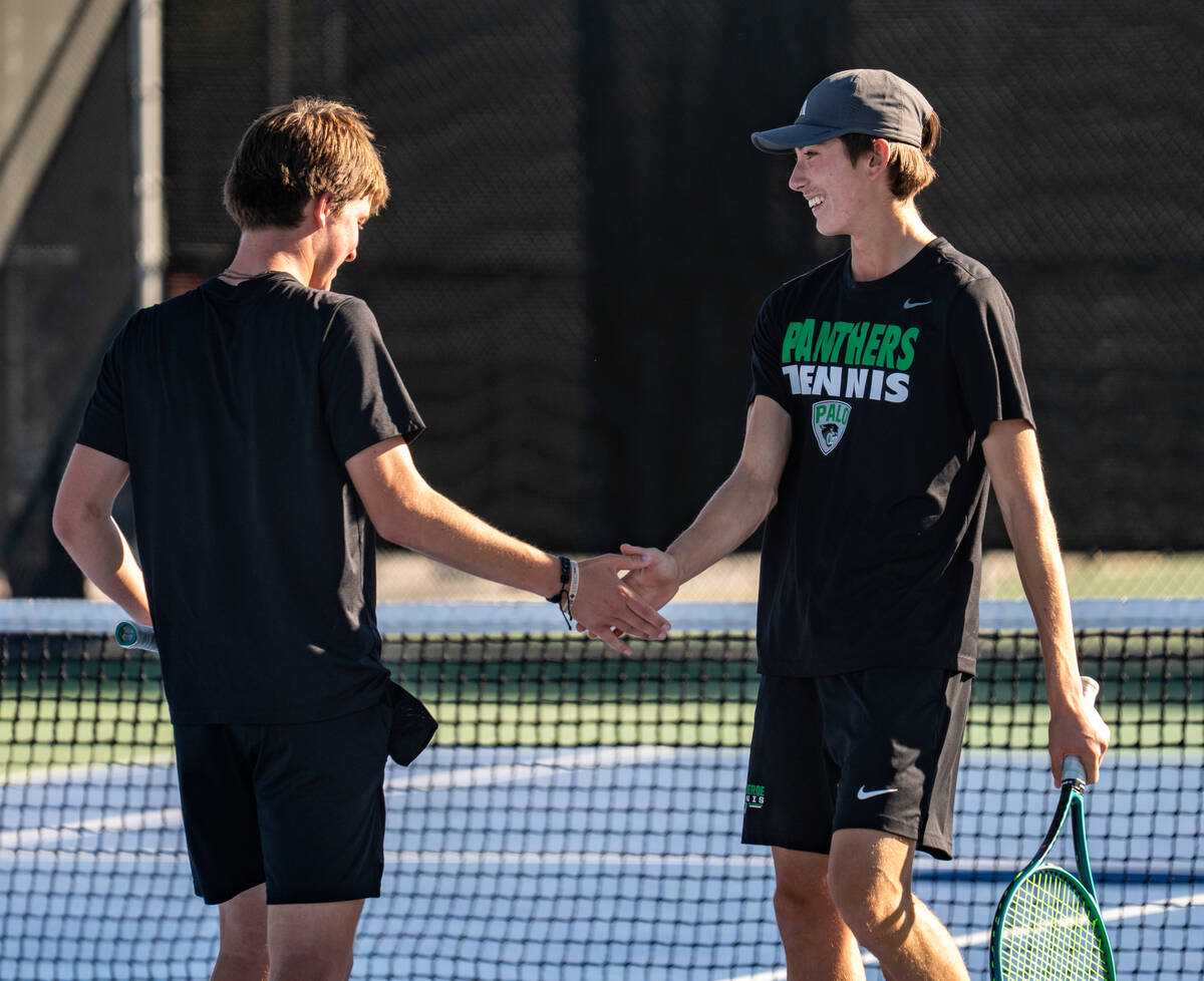 [HELP IDing NEEDED] Palo Verde double’s partners celebrate after winning a point during ...