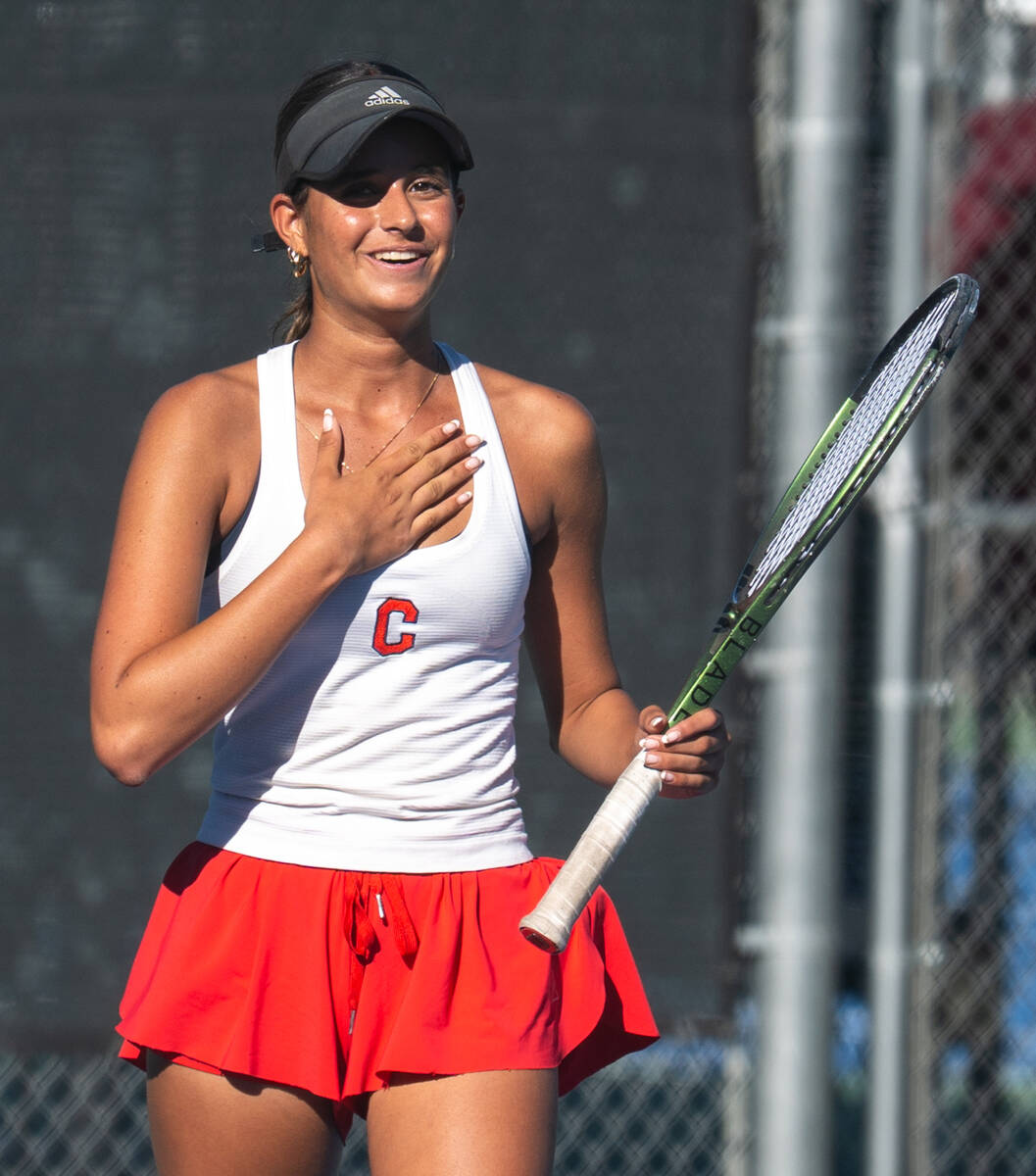 Coronado's Isabella Gallegos reacts after winning a point during the 5A state doubles titl ...