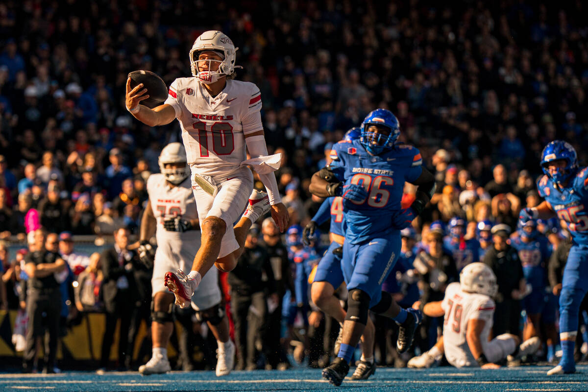 UNLV quarterback Anthony Colandrea (10) runs with the ball during the game against Boise State ...